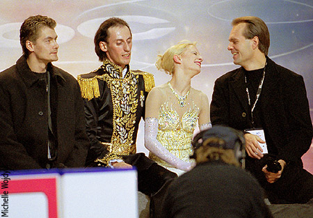 Galit Chait &amp; Sergei Sakhnovski in the kiss &amp; cry with coaches