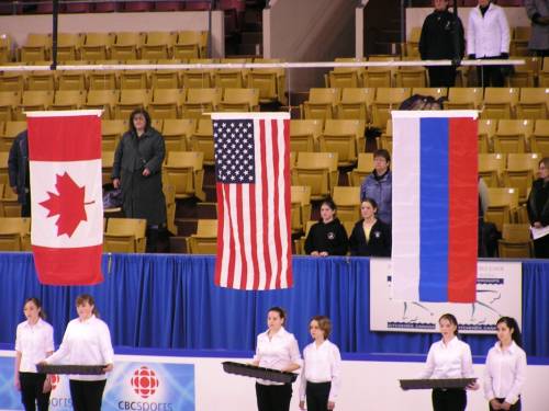 The medalists flags are raised.