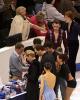 Crowd grows at the autograph table