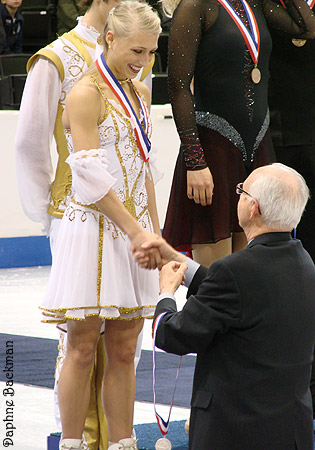 Piper is congratulated after receiving her silver medal