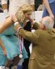 Megan Evans receives her silver medal