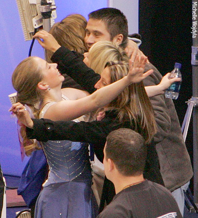 Wolf &amp; Ainsworh celebrate with their coaches