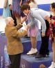 Andrew Korda receives his bronze medal
