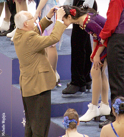 Anastasia Olson receives her pewter medal