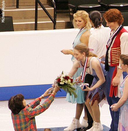 Chloe Wolf receives her bouquet