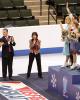The medalists acknowledge the crowd