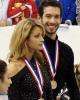 One gold medalist looks happier than the other