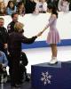 Meryl gives Charlie a hand onto the podium