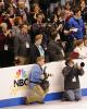 Photographers are ready for the medal ceremony to begin