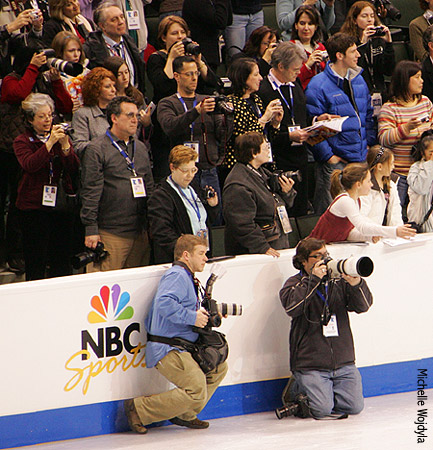 Photographers are ready for the medal ceremony to begin