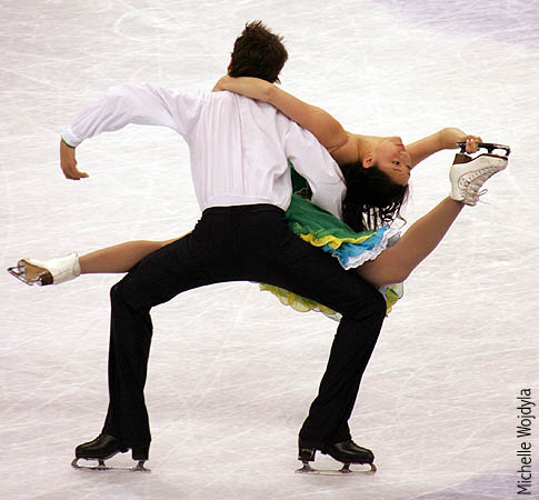 Stacy Kim holds on to partner Jonathan Harris