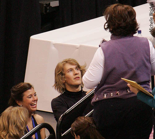 Clare Farrell and Chase Fishpaw sign autographs