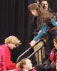 Charlie White signing autographs at practice