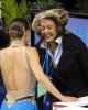 Not every coach can pull off the "Hillary Clinton in a typhoon" hairstyle