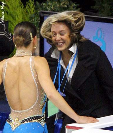 Not every coach can pull off the "Hillary Clinton in a typhoon" hairstyle