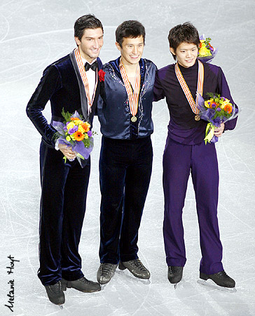 Evan Lysacek (USA) silver, Patrick Chan (CAN) gold, Takahiko Kosuka (JPN) bronze