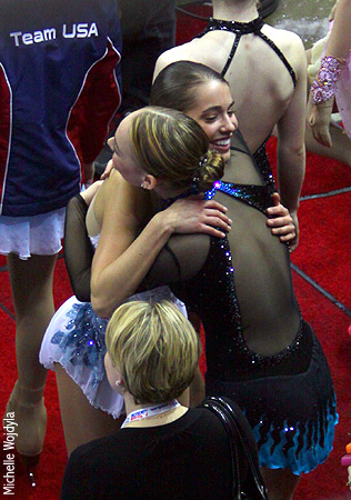 After her awesome short program, Alissa Czisny runs over to hug best friend Melissa Telecky, who was waiting to take the ice for the second flight of senior ladies