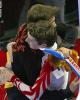 Brandon Mroz stayed to watch trainingmate Ryan Bradley's free skate and congratulates him at the end