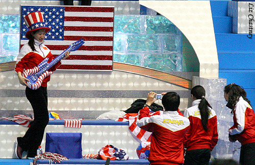 Team China, having just experienced the thrill of team spirit, crash the USA Party Condo for pics for their Facebook pages...