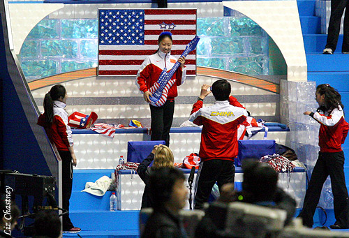 Everyone gets a chance to stand in front of the glitter flag with the inflatable guitar...