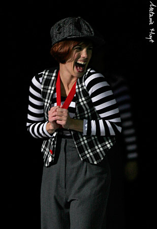 "Heeee!  Dave still hasn't realized that I taped a 'kick me' sign on his back!"