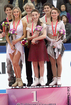 The NHK dance medalists atop the pink podium The NHK dance medalists atop the pink podium