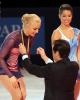 Kiira Korpi (FIN) receives her gold medal as Alissa Czisny (USA) looks on