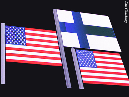 The scoreboard-generated flags are "raised"