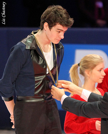 Brandon Mroz (USA) receives his bronze medal
