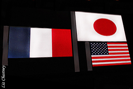 The scoreboard-generated flags are "raised"