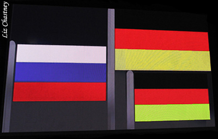 The scoreboard-generated flags are "raised"
