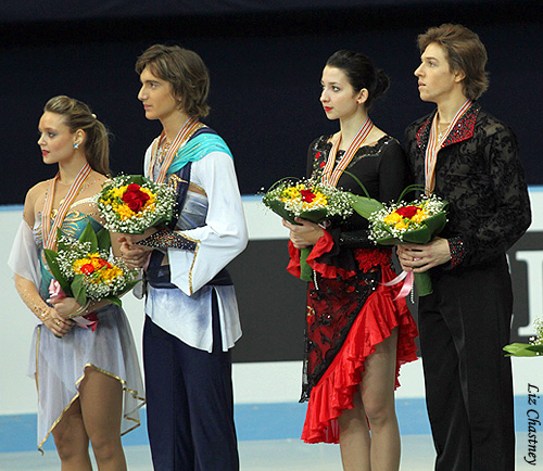 The Russians listen to their national anthem being played