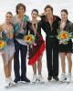 The ice dance medalists pose for photos