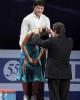 Maia Shibutani received the bronze medal from ISU president Ottavio Cinquanta