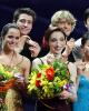 The 2011 champions show off their medals in Moscow