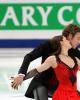 Nathalie Pechalat &amp; Fabian Bourzat (FRA) in front of the Mary Cohr sponsor board signage