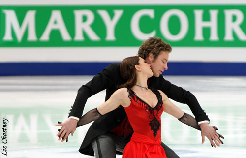 Nathalie Pechalat &amp; Fabian Bourzat (FRA) in front of the Mary Cohr sponsor board signage