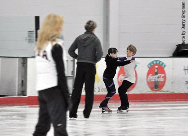 Juvenile dancers Eliana Gropman &amp; Ian Somerville skate while Belbin &amp; White look on