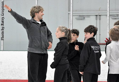 White works with the juvenile and intermediate ice dancers