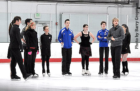 White instructs the novice ice dancers