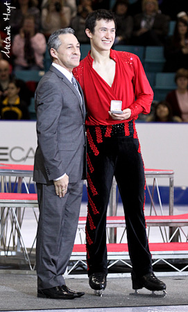 Patrick Chan receives the Otto Gold pin from Benoit Lavoie