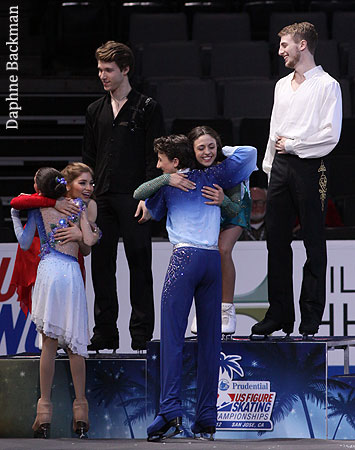 Hugs between medalists