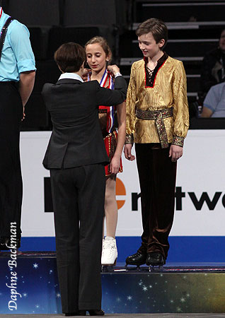 Chloe Lewis &amp; Logan Bye receive their pewter medals from U.S.F.S. President Pat St. Peter