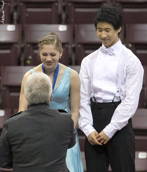 Madeline Edwards & ZhaoKai Pang receive the gold medals
