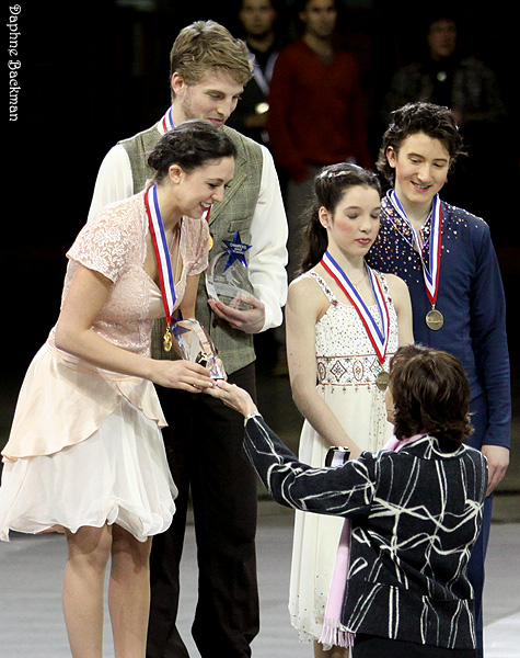 Alexandra Aldridge & Daniel Eaton accept the championship trophy