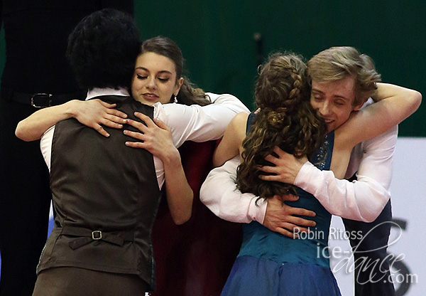 Edwards & Pang (CAN) hug Hawayek & Baker (USA)