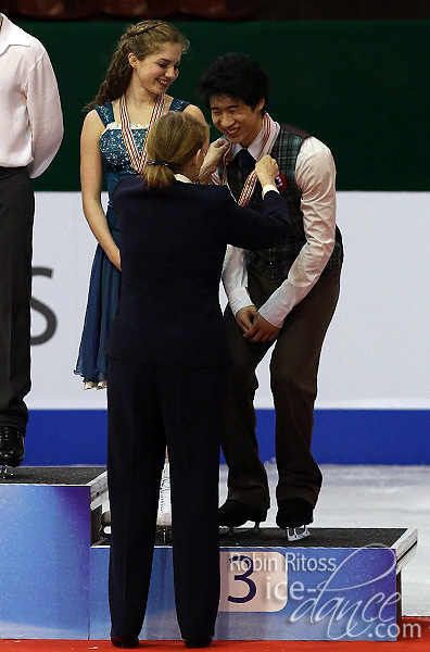 Madeline Edwards & ZhaoKai Pang (CAN) receive their medals