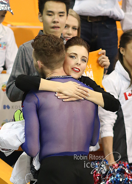 Ashley Wagner hugs Adam Rippon as he leaves the ice