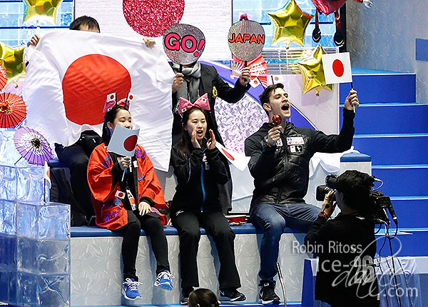 Team Japan cheers as Muramoto & Reed take the ice