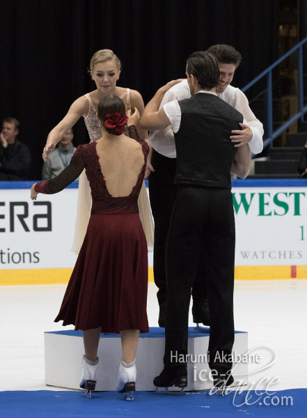 Fournier Beaudry & Sorensen and Stepanova & Bukin exchange congratulatory hugs